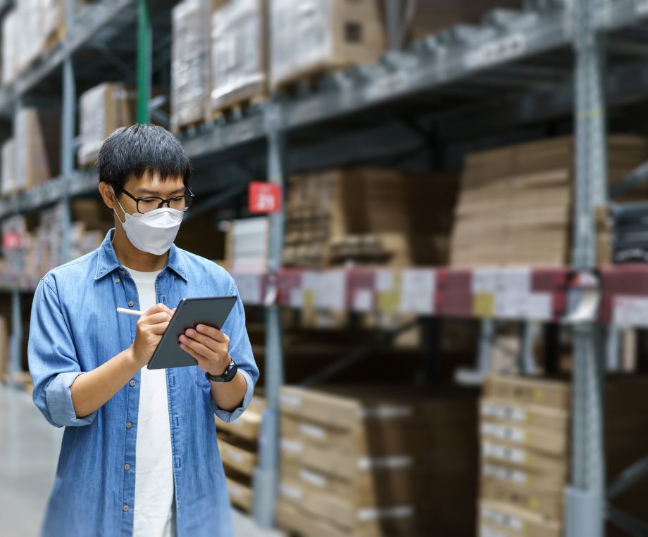 people checking items for procurement