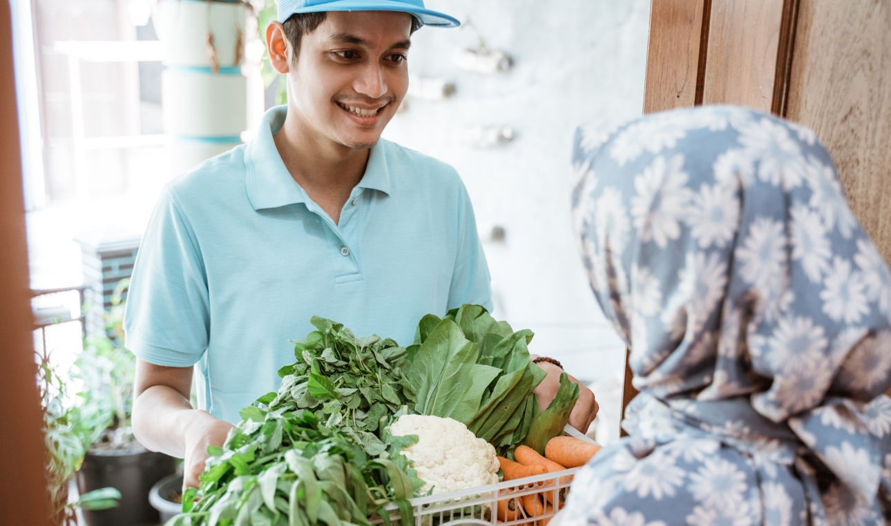 young man with vegetables