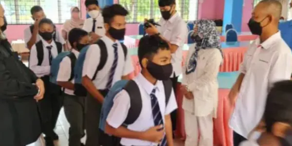 319 murid orang asli terima bantuan sekolah